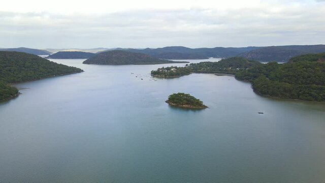 Calm Water Of Mooney Mooney Creek With Green Island - Mooney Mooney Suburb In New South Wales, Australia. - aerial