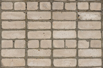 Texture of a lined brick wall.