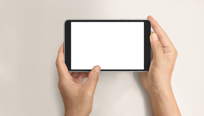 Hands holding tablet touch computer gadget