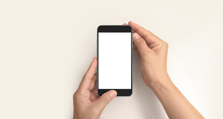 Hand holding smartphone device touching screen