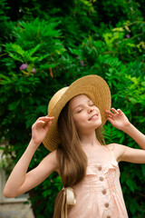 Stylish portrait of smiling girl in hat. Summer season.