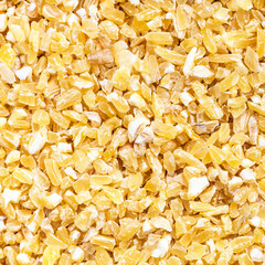crushed polished wheat grains close up