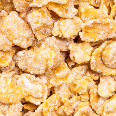 raw sugar coated cornflakes close up