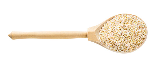 spoon with crushed pot barley groats isolated