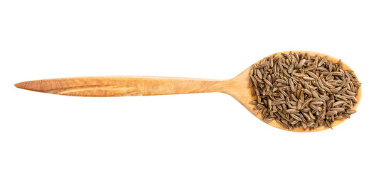 top view of wood spoon with caraway seeds isolated