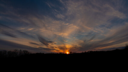 Sunset view in Roprachtice village in Krkonose mountains with color sky