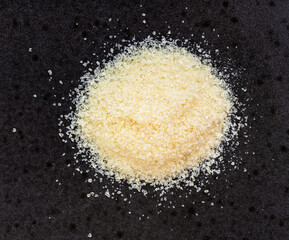 pile of crystalline beef gelatine closeup on black