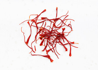 several crocus saffron threads close up on gray