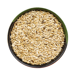 scagliola canary seeds in round bowl isolated
