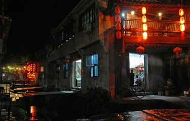 Xiao Likeng in Wuyuan County, Jiangxi Province, China. Xiao Likeng is an ancient town in Wuyuan County known for its Tang Dynasty architecture. View of the town at night with red lanterns