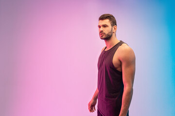 Focused bearded european young man in studio