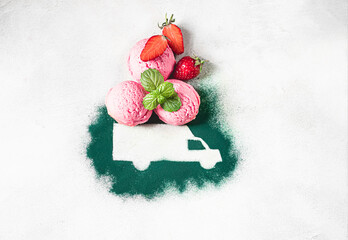 Obraz na płótnie Canvas Car made of green powder and balls of berry ice cream on a light background. Online shopping. Concept of delivery services, logistics, cargo delivery. Food delivery.