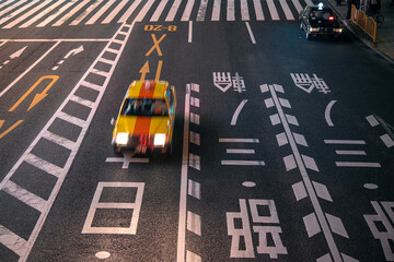 Motion blurred Yellow taxi cab in Tokyo at night　夜の東京を走るタクシー