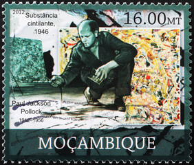 Jackson Pollock at work on stamp of Mozambique - obrazy, fototapety, plakaty