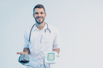 Male doctor showing digital tonometer in hands