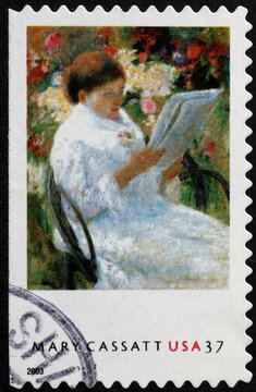 Sitting woman painted by Mary Cassatt on american stamp
