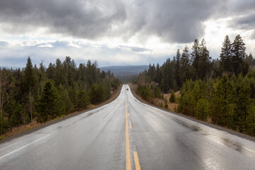 Naklejka premium Scenic Road in the country side during a rainy stormy day. Taken between Merritt and Kamloops, British Columbia, Canada.