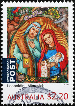 The holy family surrounded by australian animals on stamp