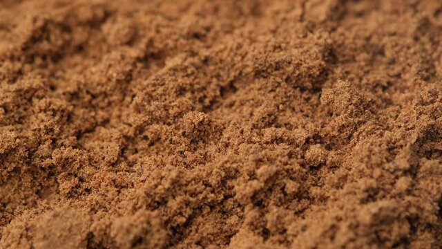ground nutmeg close up, rotation. 4K UHD video