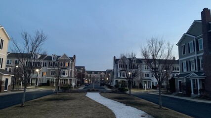 Hingham Shipyard condos in the sunset, Streets lit by streetlights