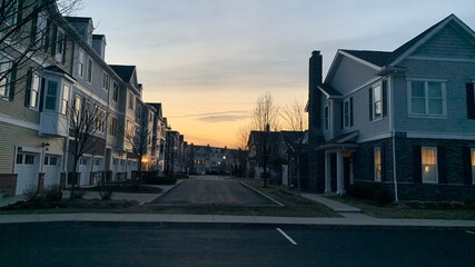Hingham Shipyard condos in the sunset, Streets lit by streetlights