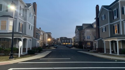 Hingham Shipyard condos in the sunset, Streets lit by streetlights