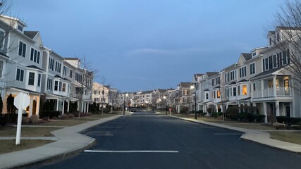 Hingham Shipyard condos in the sunset, Streets lit by streetlights