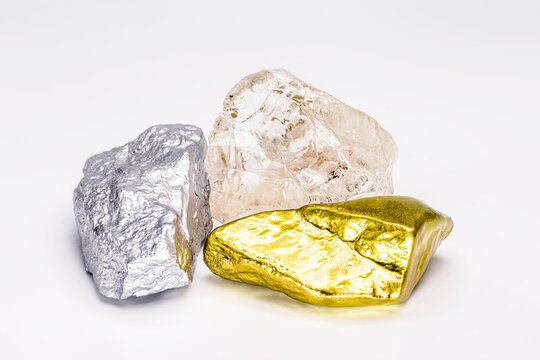 Gold stone and silver ore and rough diamond, isolated on white background, concept of precious metals mining and mineral extraction.