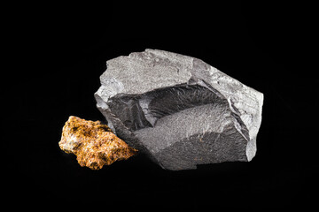 Iron ore and bauxite on isolated black background, ores used in the foundry industry