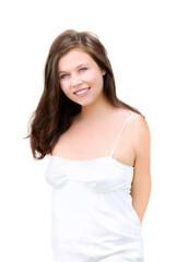 Fototapeta premium Portrait of a beautiful young smiling woman with her hands on her back, closeup in front of white studio background