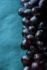 A bunch of black grapes close up