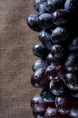 A bunch of black grapes close up