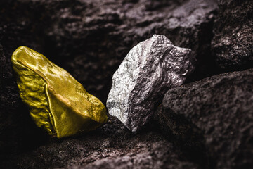 silver nugget and gold stone in mine, concept of rare stone mining or mineral extraction