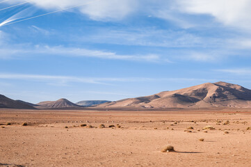 Plakat desert and magnificent Atlas mountains landscape graphic layers of rock form seductive curves