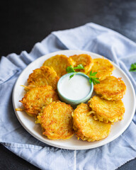 potato pancakes draniki vegetable dish fried potato cutlets fresh wholesome dish on the table healthy food meal snack copy space food background rustic