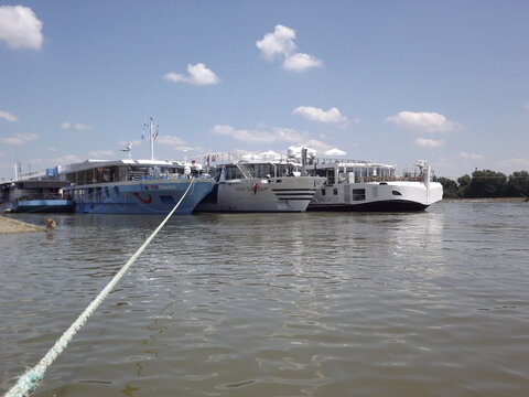 Novi Sad, Serbia - March 05. 2013: Anchored passenger ships on the promenade by the river Danube in Novi Sad.