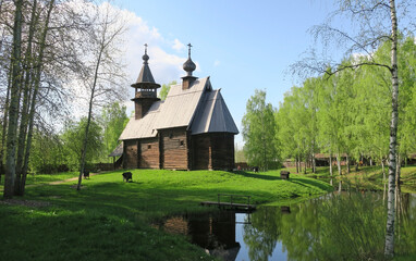 Obraz premium Wooden Russian ancient church made of wood