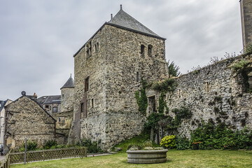 Fototapeta na wymiar Architectural fragments of Fecamp Abbey. Fecamp Abbey (Abbaye de la Trinite de Fecamp) founded in 658 for nuns. Fecamp, department of Seine-Maritime, Haute-Normandie region, France. 