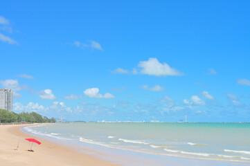 Fototapeta premium Seascape with white beach, Landscape summer beach background, with the sunny sky at the sea in Thailand