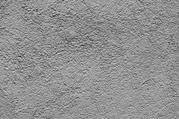 Gray texture background. Concrete wall. Rough surface. Stone texture. Uneven, scratched, lumpy.