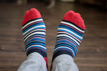 feet in colorful socks