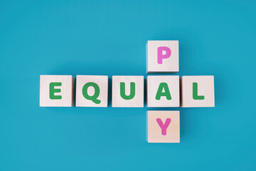 EQUAL PAY text on wooden blocks