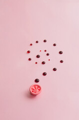 Metaphor of the anus on a pink background. concept of the cause rectal bleeding