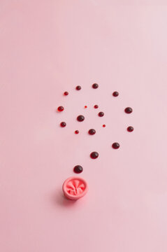 Metaphor of the anus on a pink background. concept of the cause rectal bleeding