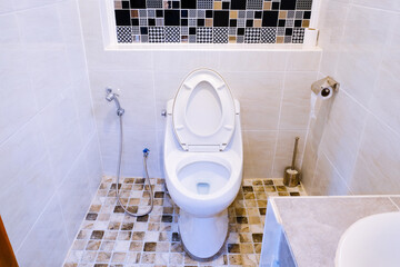 Toilet bowl in a modern bathroom ,flush toilet clean bathroom