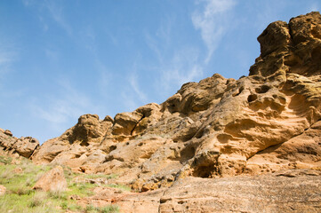 Fototapeta premium Sandstone of Mount Bogdo in the steppe in the Astrakhan region (Caspian lowland). Mount Bogdo Is a nature reserve and is protected by the state.