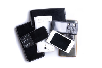 Pile of mobile phone on white background, Reuse and Recycle concept