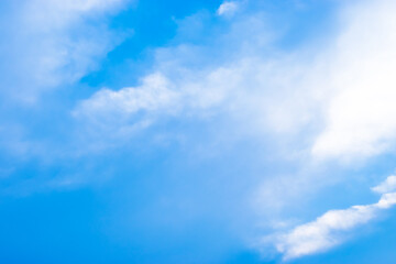 White clouds cumulus floating on blue sky for backgrounds.