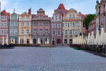 Naklejka na ściany i meble Poznan. Old Town Square with famous medieval houses at sunrise.