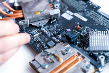 Computer chip electronic repair. Hardware engineer technology maintenance. Man technician pc service.